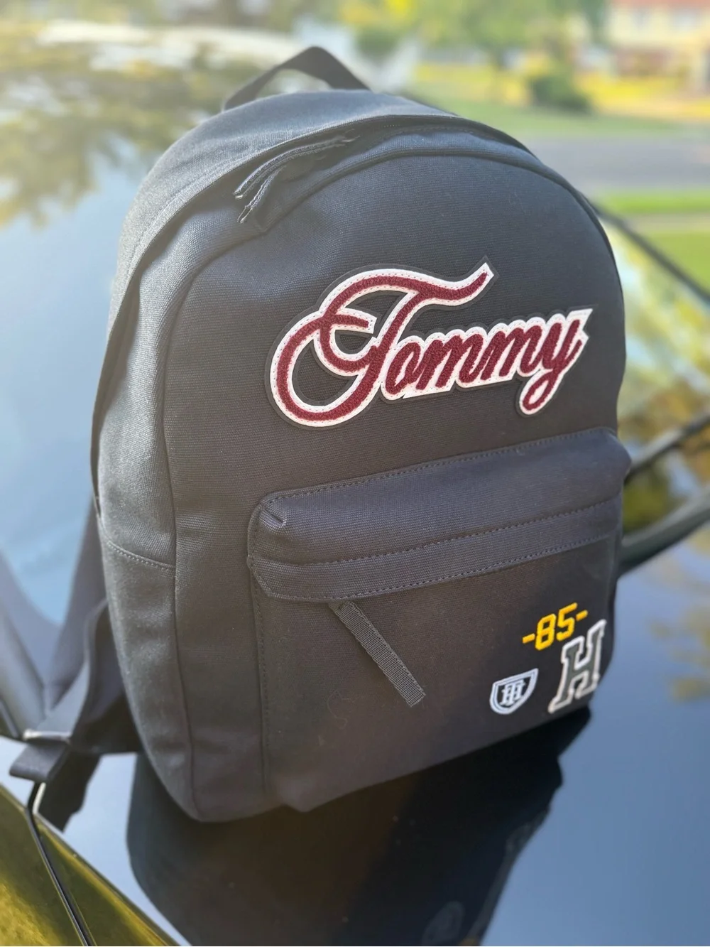 Tommy Hilfiger Black Backpack with Maroon Script Patch
